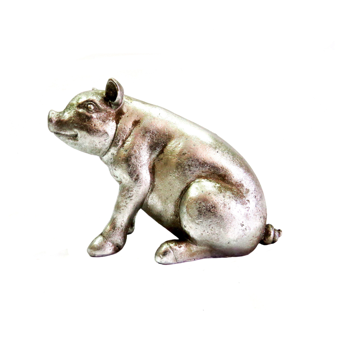 Zuzu The Pig is a stunning antique silver pig, measuring 23cm in length and 16.5cm in height. Made with precision, this 450g pig is visually appealing and exudes a sense of elegance. Its robust size is definitely a compliment to its design-unique boys