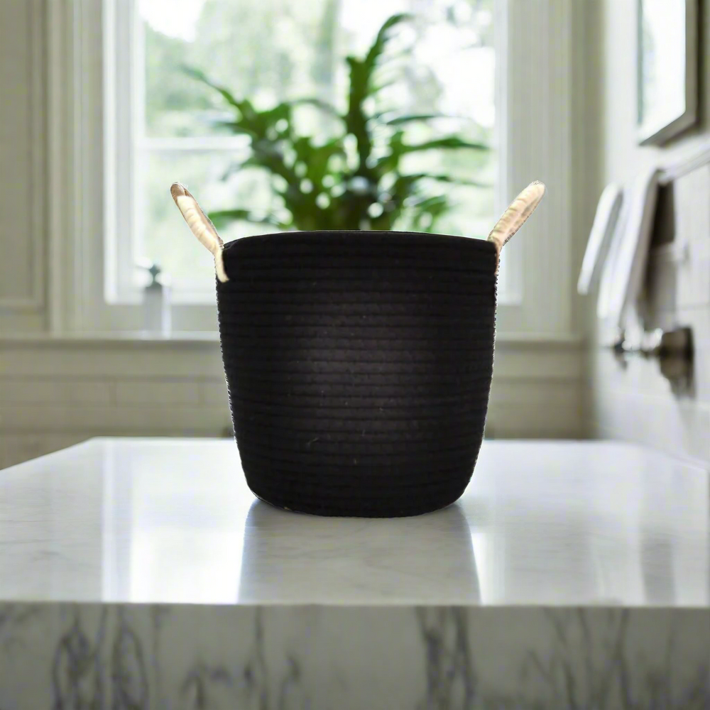 Elevate Your Home Decor with the Exquisite Ethio Basket 25x25
Add a touch of modern elegance and sophistication to your space with our expertly woven Ethio Basket 25x25. Measuring 25cm in height and width, this stunning basket features a beautiful black cotton weave design with crisp white handles, perfect for adding a sleek and refined touch to any room.
Perfect Blend of Style and Functionality