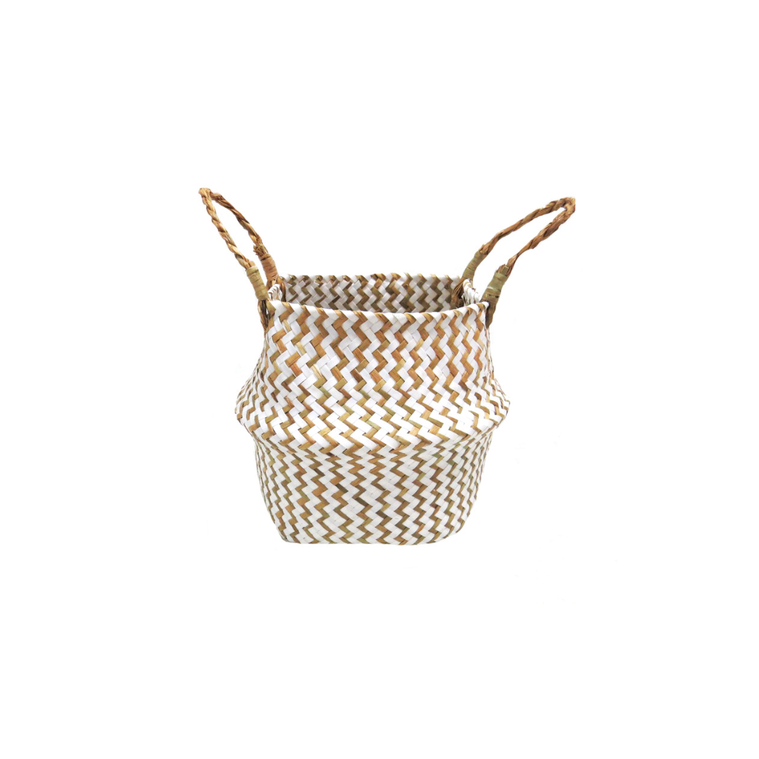 This Piccolo basket is made from chevron weave in stunning white and natural colors. Its exquisite twist handle makes it the perfect container for everyday items such as croissants, rolls and eggs. With its long-lasting quality and stylish finish, this basket will serve any purpose you require- UNIQUE INTERIORS