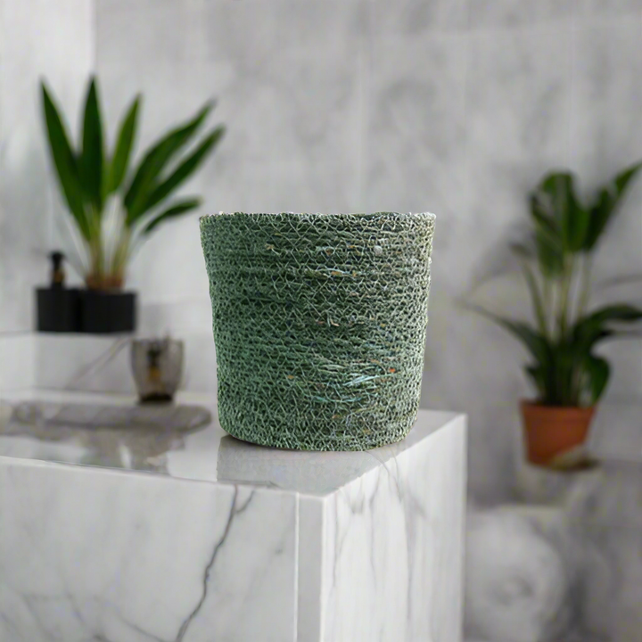 Liberon Basket: Natural Elegance for Your Home
Add a touch of organic charm to your space with our stunning Liberon Basket. Beautifully woven from natural jute fibers in a soothing misty grey, blue, and green hue, this planter basket is a perfect blend of form and function.
Exquisite Craftsmanship