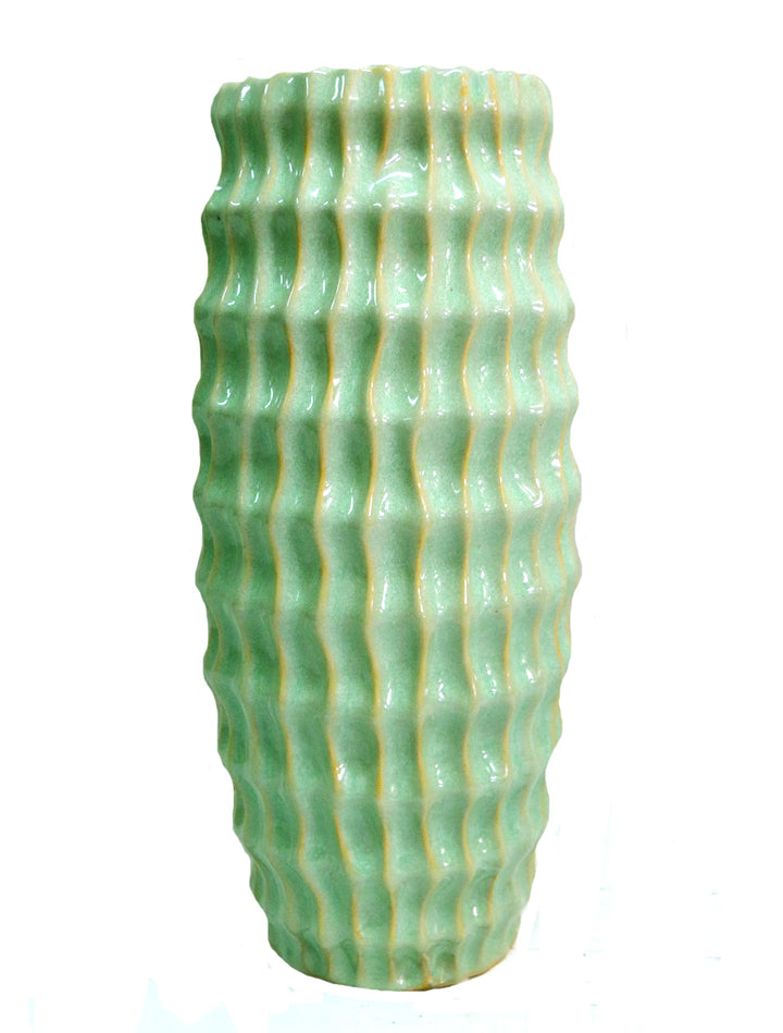 Atlantis Vase - Lime Green Ceramic Masterpiece
Elevate your space with the vibrant Atlantis Vase, a stunning ceramic piece boasting a striking lime green glaze. Its elegant design combines aesthetic appeal with functionality, perfect for adding a pop of color to any room