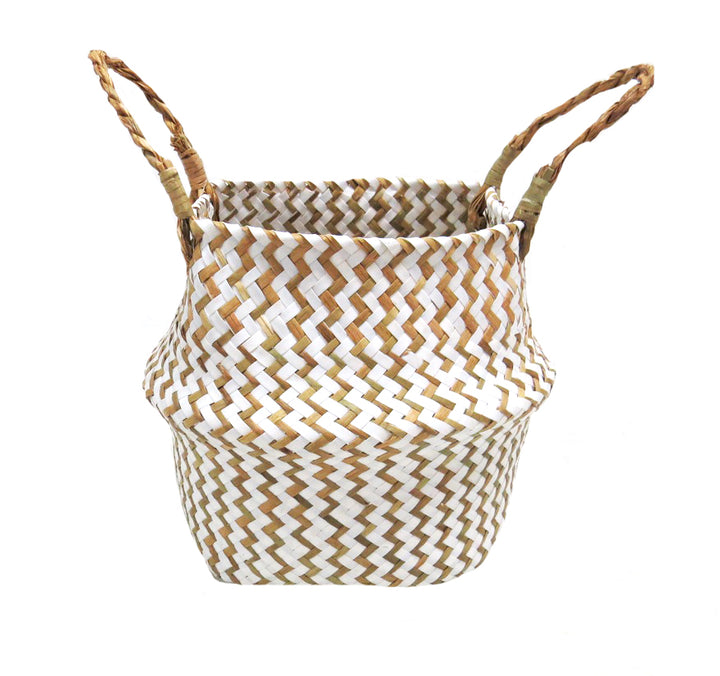 This Piccolo basket is made from chevron weave in stunning white and natural colors. Its exquisite twist handle makes it the perfect container for everyday items such as croissants, rolls and eggs. With its long-lasting quality and stylish finish, this basket will serve any purpose you require- UNIQUE INTERIORS